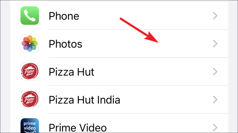 tap photos to disable photos from spotlight search