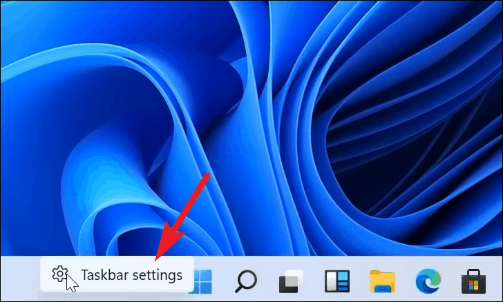 go to taskbar settings to Left Align Taskbar on Windows 11